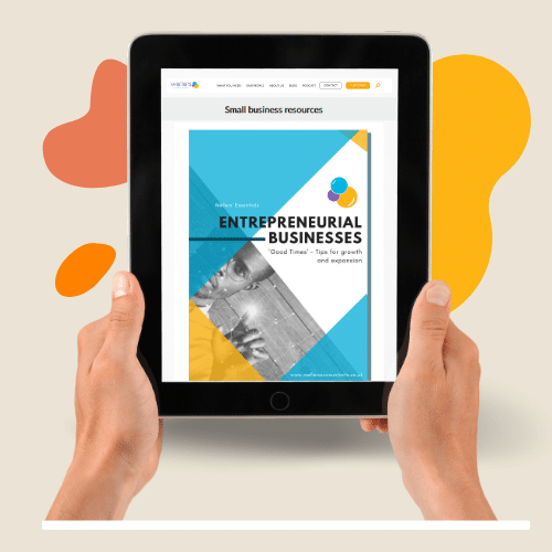 Hands holding iPad with cover of Wellers business guide Hands holding iPad with cover of Wellers business guide