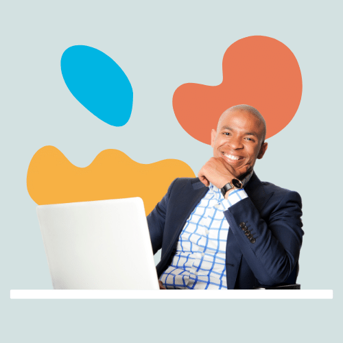 Man sitting at desk on laptop