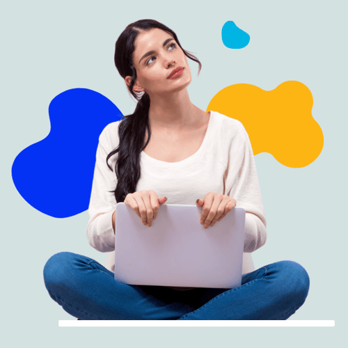 Woman sitting with laptop