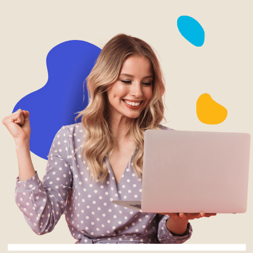 Woman on computer smiling as she looks at monitor